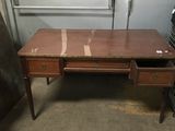 a desk with two drawers on it in a room