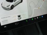a picture of a car on the screen of a computer