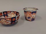 two bowls sitting next to each other on a table
