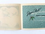 un livre contenant une carte de Noël