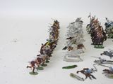 a lot of figurines that are sitting on a table