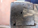 a close up of a piece of wood with a hole in it