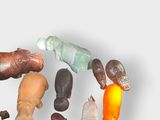 a lot of different types of plastic objects on a white surface