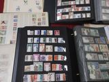 many different types of stamps on the pages of a book