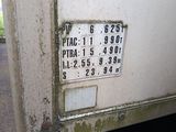 a sign on the side of a truck telling the temperature
