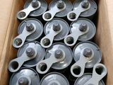 a cardboard box filled with lots of different types of wheels
