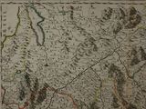 an old map of the country of france on the wall