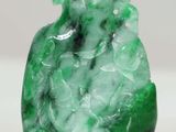 chinese carved green jade snuff bottle with a figure of a man