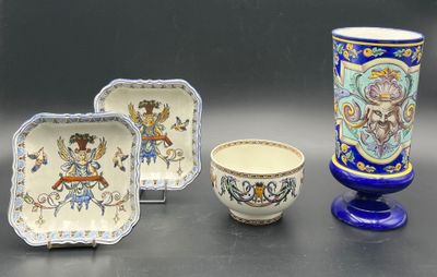 three different pieces of pottery sitting on a table