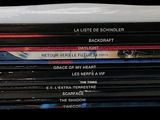 a lot of dvds stacked on top of each other