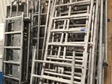 many different types of pipes and hoses in a warehouse