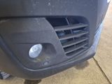 a close up of a car ' s front grill and front bumper