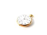 a pocket watch that is sitting on a table