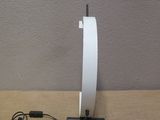 an image of a desk lamp with a charger attached to it