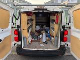 a white van that has a lot of stuff in it