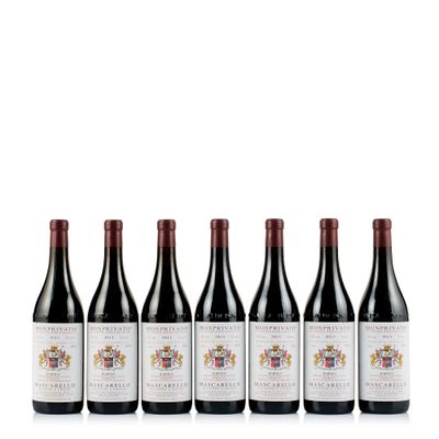 six bottles of red wine lined up in a row
