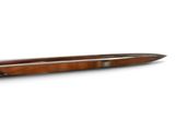 an image of a pen with a wooden handle