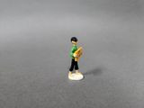 a small figurine of a man holding a baseball bat