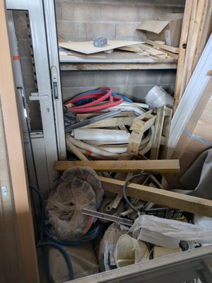 a picture of a room that has a bunch of items in it