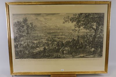une vieille photo représentant un tableau illustrant une scène militaire, dans un cadre doré