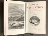 an open book with a picture of a boat in the water