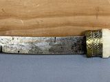 a picture of a knife that is on a piece of paper