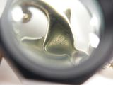 a close up of a magnifying glass on a table
