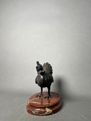 bronze figurine of a turkey on a marble base