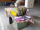 a machine that is sitting on a table in a warehouse