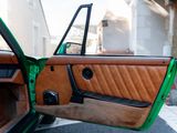 a brown and green car door with a green trim