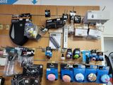 many different items on the wall in this store