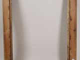 a close up of a wooden frame with a white background