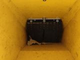 a yellow box with a black box inside of it