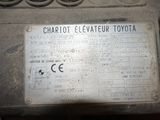 a close up of a sign on a car ' s engine