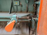 an image of a machine that is cutting a sheet of paper