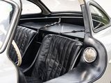 a black seat in the back of a white car