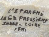 a close up of a rock with writing on it