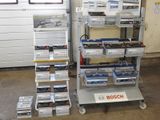 many different types of batteries on the cart