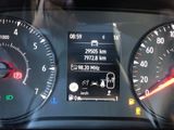 a close up of a car dashboard with various gauges