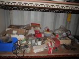 a shelf with a lot of assorted items on it