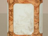 a picture of a picture of a vase on a table