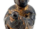 an image of a statue of a person holding a baby