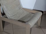 a chair that is sitting on the floor in the room
