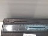 a close up of a measuring ruler on a table