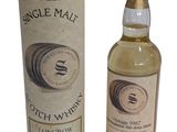 a bottle of scotch whisky next to a cardboard box