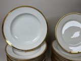 a lot of plates that are stacked on top of each other