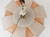 a light that is on top of a glass plate