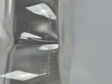 a glass of water sitting on top of a table