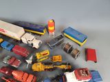 a lot of toy trucks that are on the table