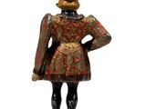 figurine of a man dressed in a red hat and coat